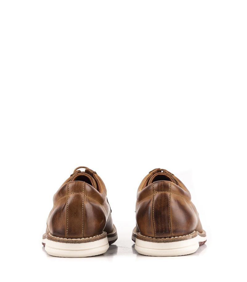Zapatos de vestir en cuero picado suela
