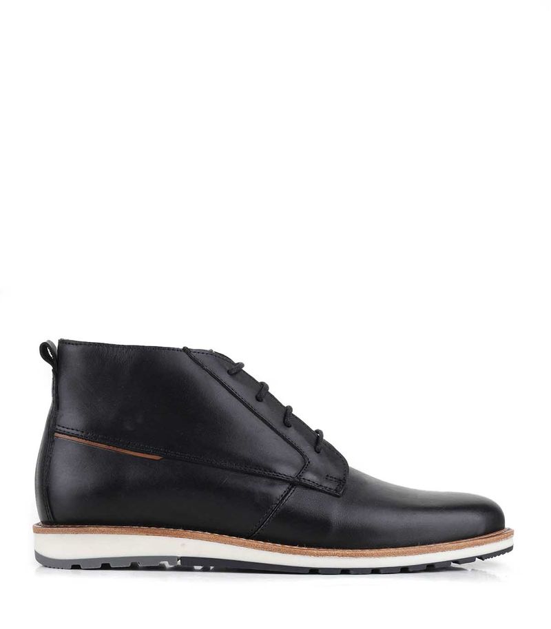Botín urbano de cuero negro con base combinada