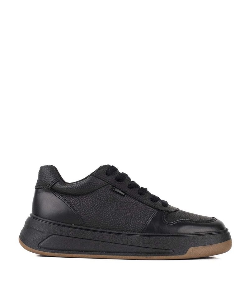 Zapatillas urbanas acordonadas de cuero negro